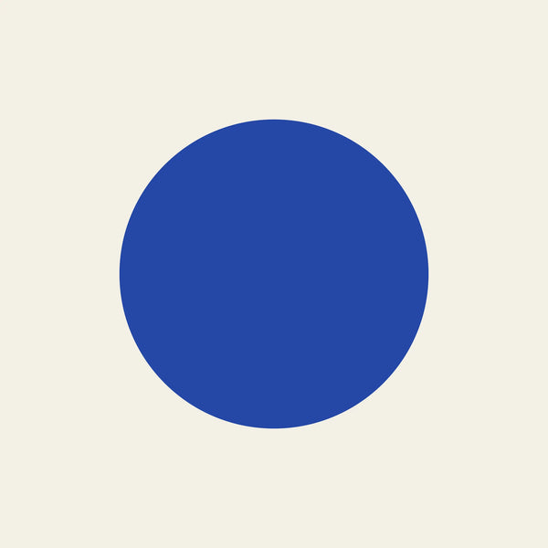 Full Moon blue circle paper coaster design from the Blue Shapes collection in cobalt blue and cream