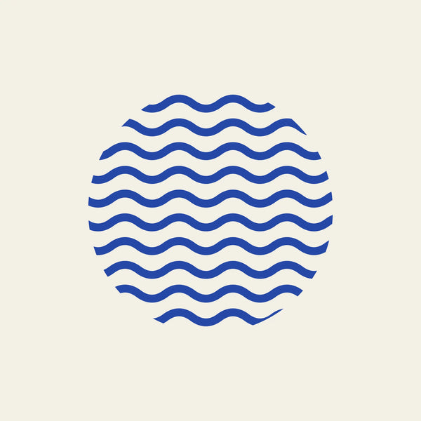 Tide wavy circle paper coaster design from the Blue Shapes collection in cobalt blue and cream