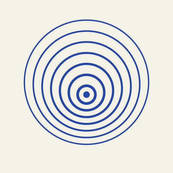 Ripple concentric circles paper coaster design from the Blue Shapes collection in cobalt blue and cream
