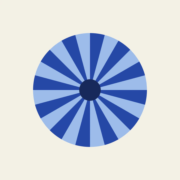 Sunburst retro paper coaster design from the Blue Shapes collection in navy, cobalt and sky blue on cream
