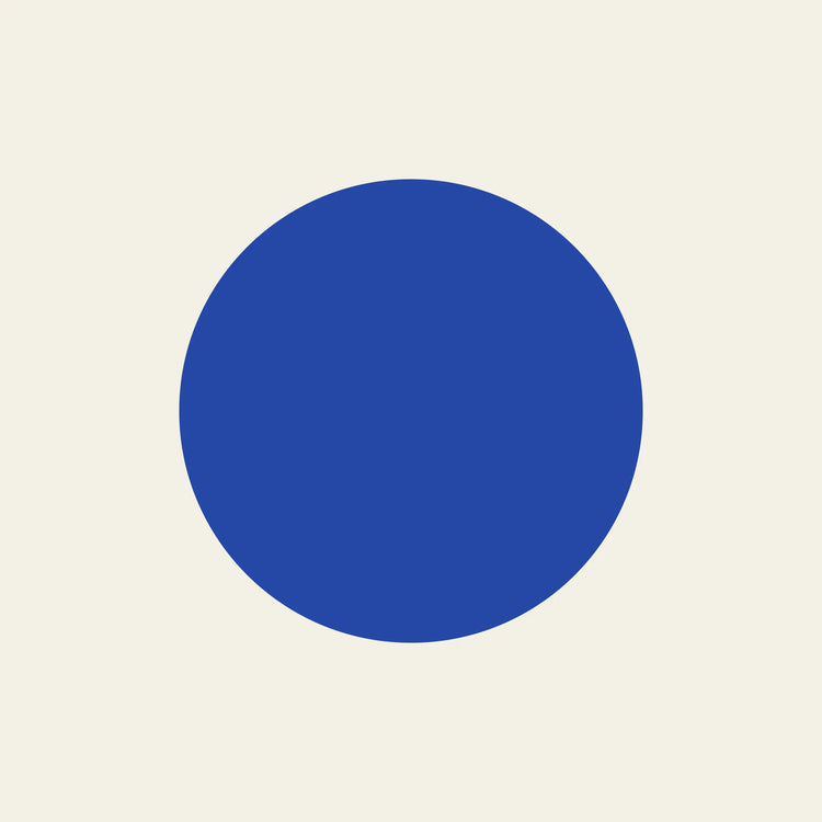 Full Moon blue circle paper coaster design from the Blue Shapes collection in cobalt blue and cream