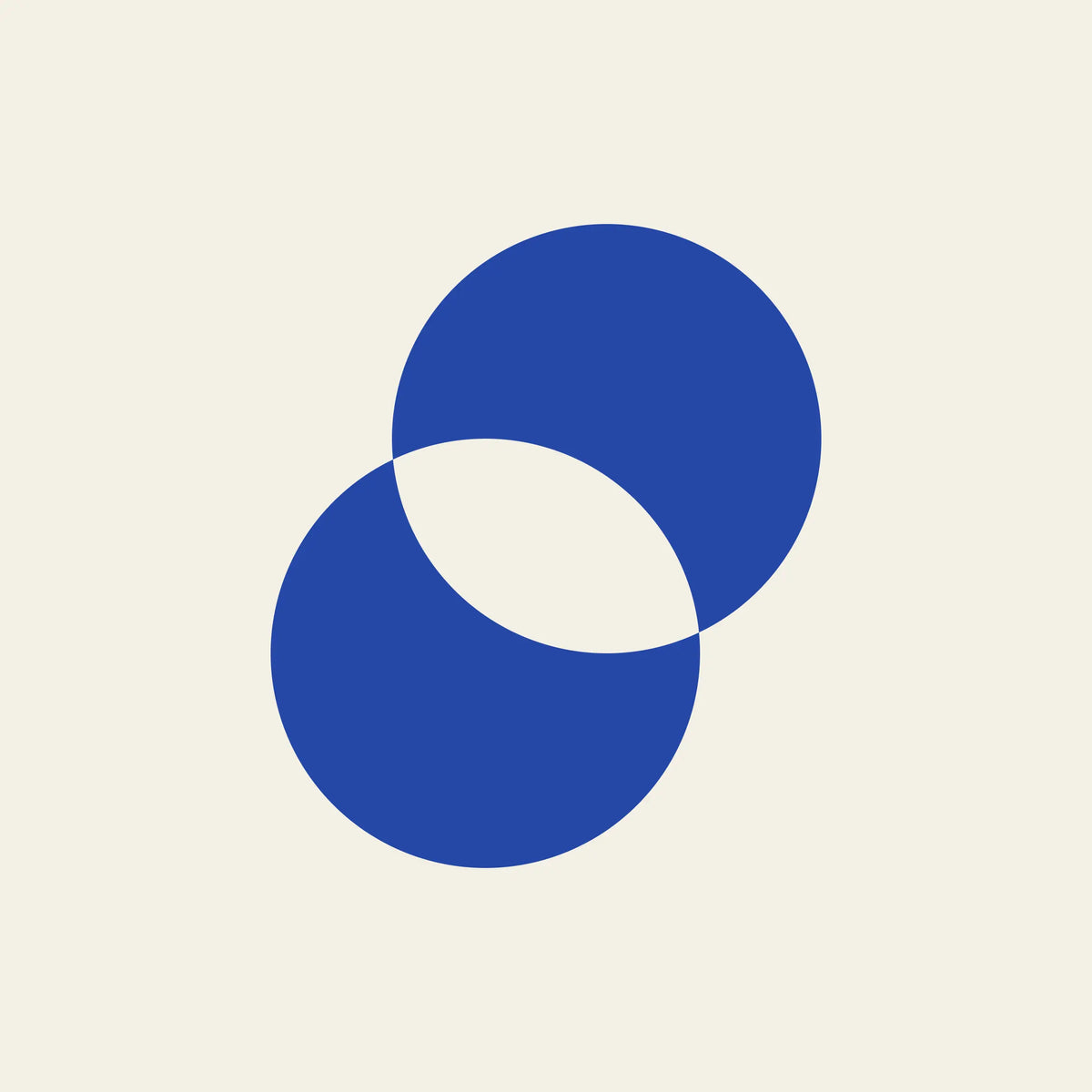 Eclipse overlapping circles paper coaster design from the Blue Shapes collection in cobalt blue and cream
