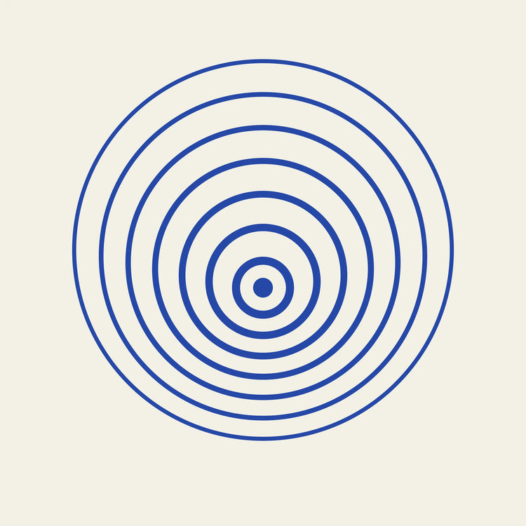 Ripple concentric circles paper coaster design from the Blue Shapes collection in cobalt blue and cream