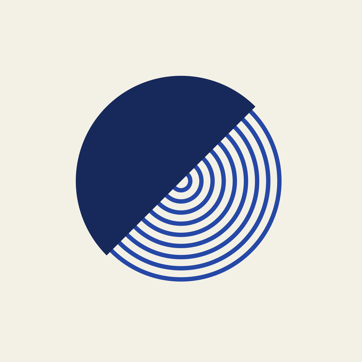 Split diagonal circle paper coaster design from the Blue Shapes collection in navy, cobalt and cream